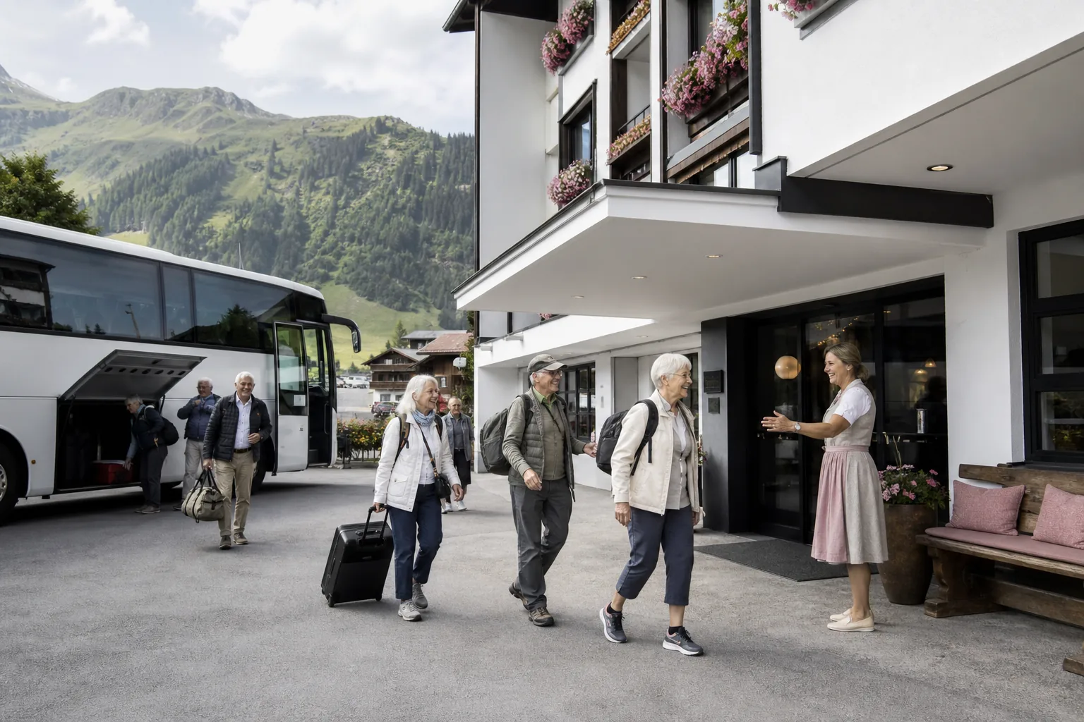 Senior coach touring group arriving at a family-run alpine hotel entrance with a coach parked directly in front on a summer morning
