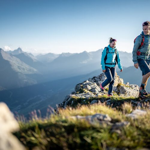 2 person hiking on mountain.